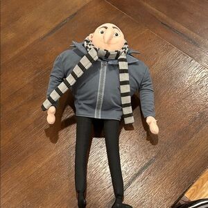 Universal Despicable Me Gru Toy with Blue Jacket and Striped Scarf